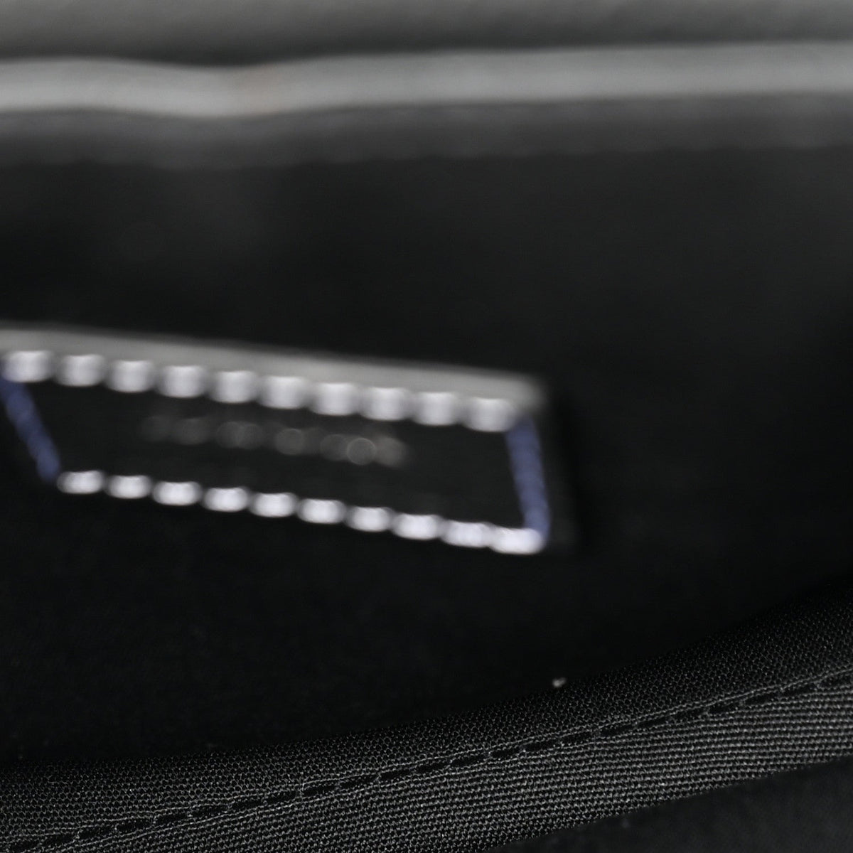 X KAWS Grained Calfskin Saddle Pouch Black